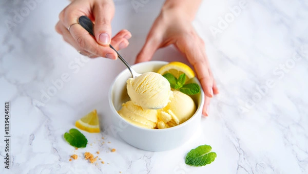 Fototapeta Ice cream with fruits mint lemon in a bowl on a plate