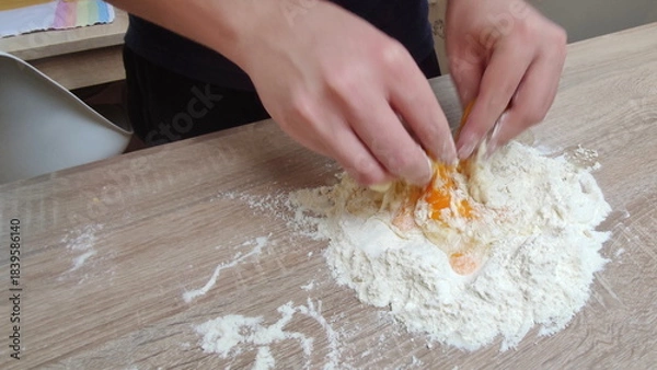 Obraz Preparing pasta carefully with flour and eggs