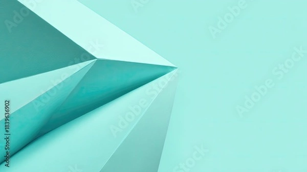 Fototapeta Teal geometric shapes create an abstract background with sharp edges.
