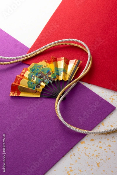 Obraz 組紐と扇と和風の敷物のイメージ