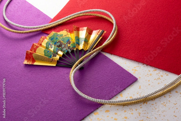 Obraz 組紐と扇と和風の敷物のイメージ