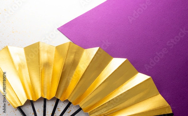 Obraz 金色の扇子と和風の敷物のイメージ