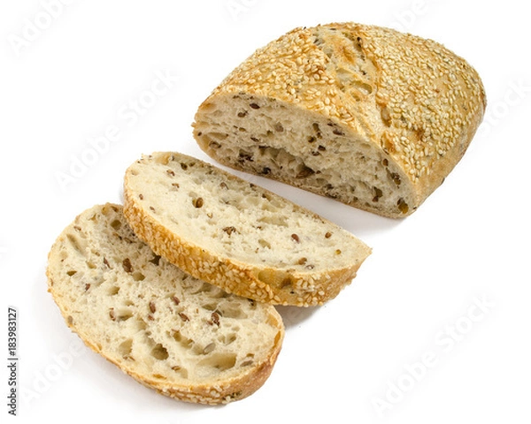 Fototapeta Sesame bread with different seeds and sliced isolated on white background