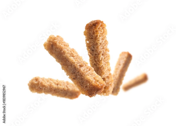 Obraz Bread croutons levitate on a white background