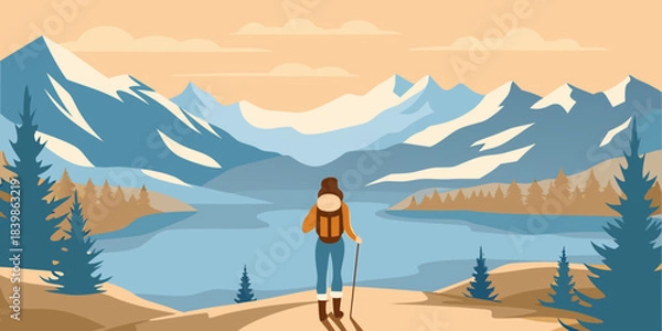 Obraz A lone hiker stands overlooking a serene lake and majestic mountain range
