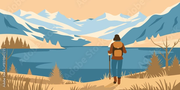 Obraz A lone hiker contemplates a serene mountain lake and snow capped peaks