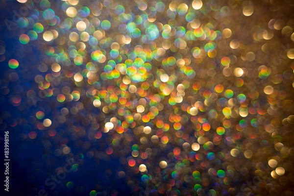 Fototapeta Golden and silver glitter backgound with bokeh abstract effect