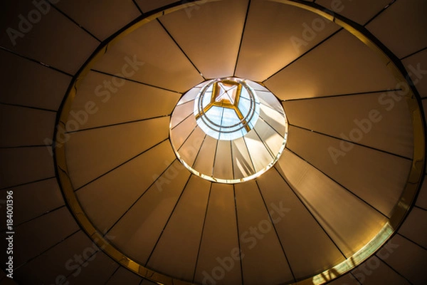 Obraz buliding roof circle, light through from above, background