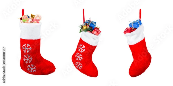 Fototapeta set of santa claus designer sock filled with gifts and presents