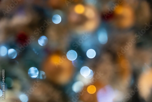 Obraz Abstract cool blue and warm golden bokeh lights for festive winter celebration and holiday background