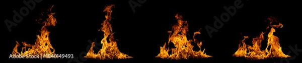 Fototapeta Realistic fire flames isolated on black background, burning effect with glowing orange heat. Perfect for overlays, design, visual effects, danger concepts, or dramatic backgrounds.