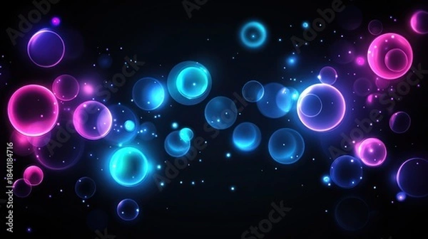 Fototapeta Abstract, glowing bubbles on a dark backdrop