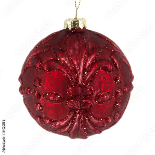 Fototapeta Deep red glass Christmas bauble with embossed floral pattern