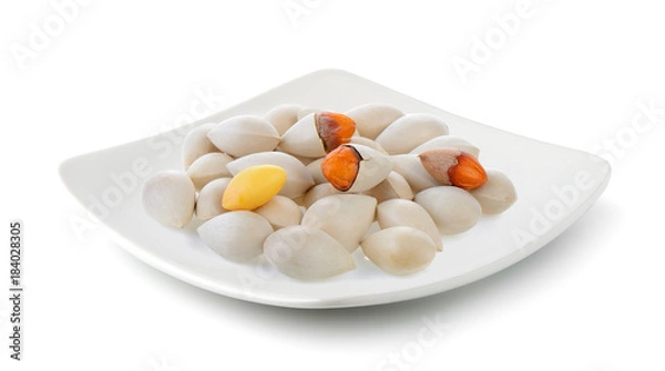 Fototapeta Ginkgo seeds in a plate isolated on white background