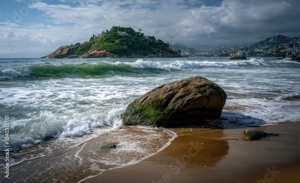 Fototapeta Coastal scene with a rock in the foreground, water, island, cloudy sky and buildings