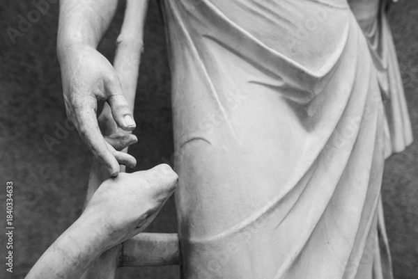 Fototapeta Details from a statue of Aesculap