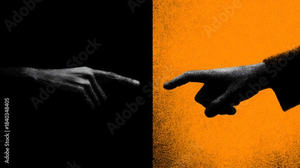 Obraz Two pointing hands separated by a stark vertical line contrasting deep shadow and vibrant orange texture symbolizing connection or division