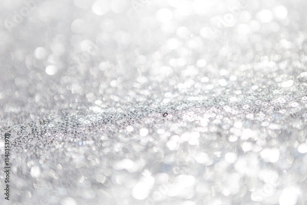 Obraz Abstract blurred light bokeh on grey background, festive season concept background, selective focus