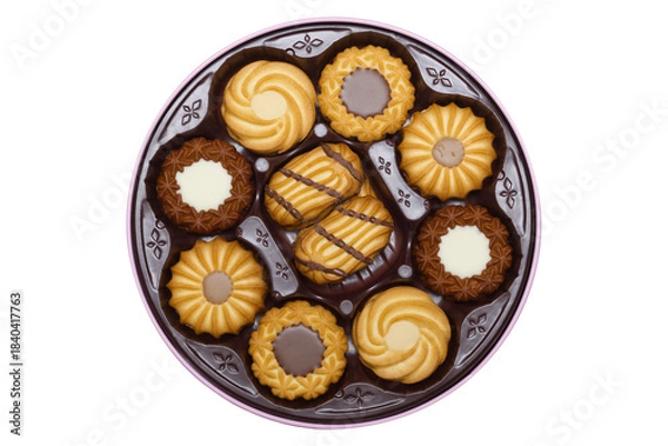 Fototapeta A top-down view of a round tin filled with various types of assorted butter cookies, including chocolate-dipped, swirl, and chocolate-filled varieties. 