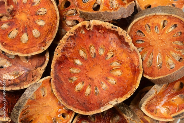 Fototapeta Pile of dried Bael fruit slices for background. Top view