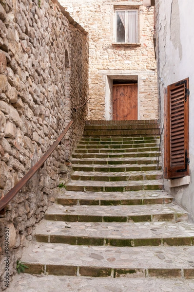 Fototapeta Stairs up in Sassocorvaro, a little town of the Montefeltro in the Marche region of Italy