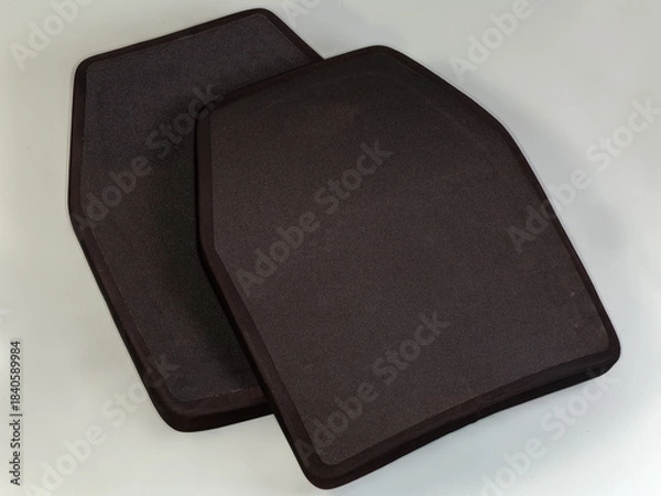 Obraz Two polyethylene armor plates for bulletproof vest on gray background