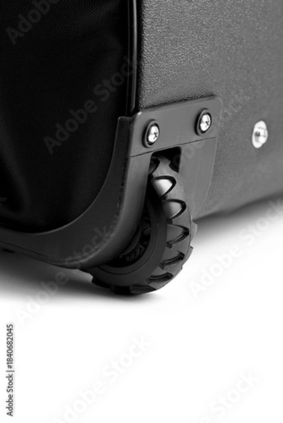 Fototapeta Wheeled and rolling backpack wheel close-up   