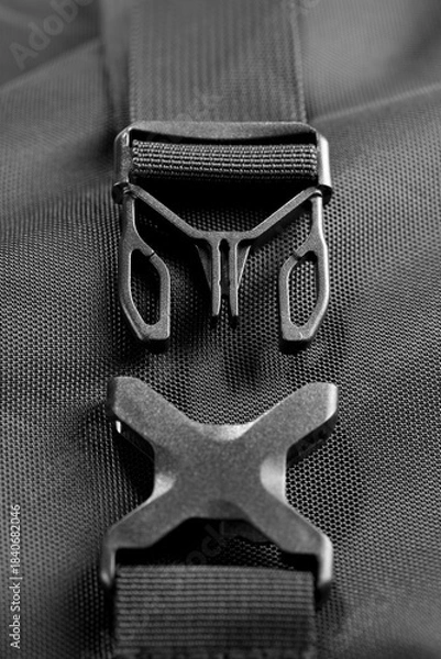 Obraz Black plastic bag push clips isolated on white background    