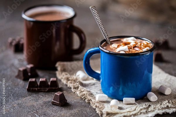 Fototapeta hot chocolate with little marshmallows in metal circles for mescaline