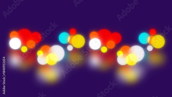 Fototapeta Glowing colorful bokeh lights in red yellow cyan and white reflecting softly on a dark purple abstract background