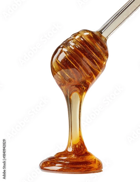 Obraz Honey dripping smoothly off dipper