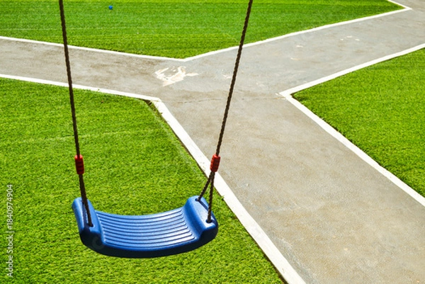 Obraz Empty swing hanging in the park
