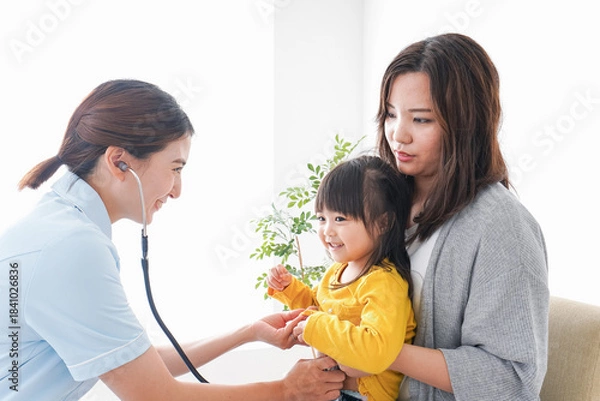 Obraz 病院で診察を受ける子ども