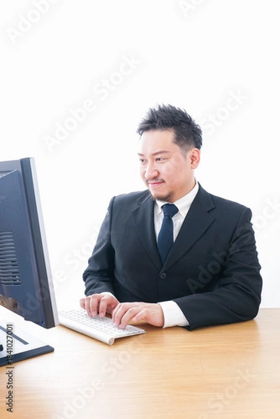 Obraz メールチェックをするビジネスマン