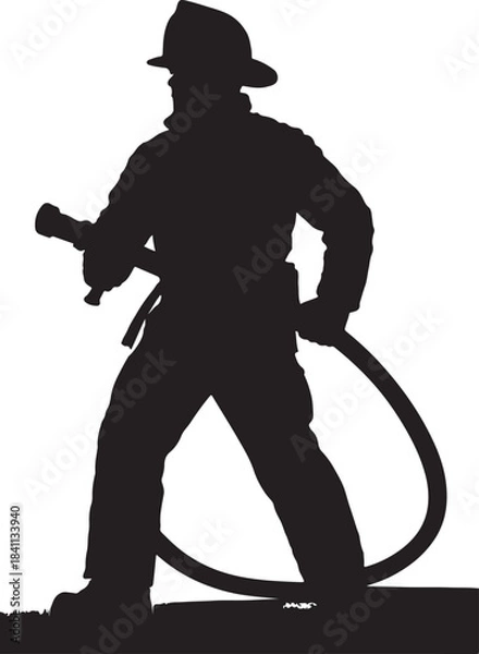 Obraz A silhouetted brave firefighter battling flames with a powerful water hose