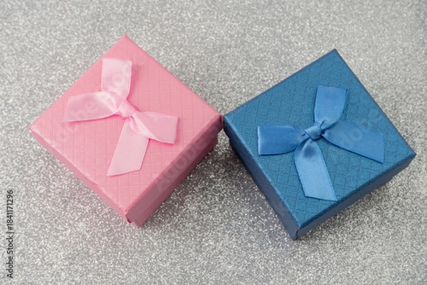 Obraz Colorful gift boxes with ribbons on shiny surface
