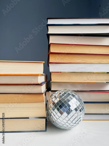 Obraz stack of books with a disco ball
