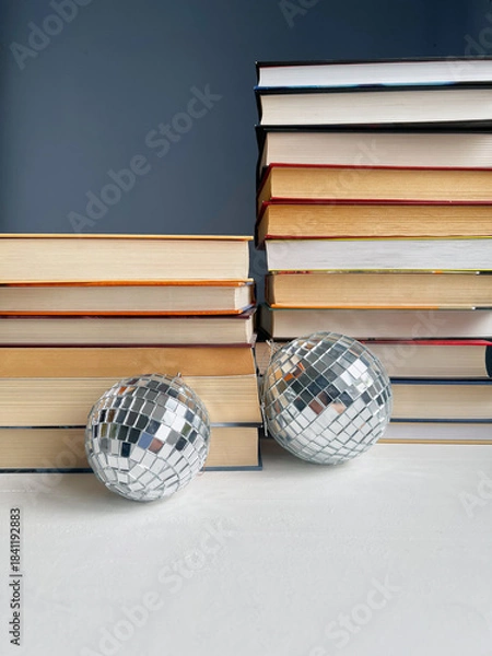 Obraz stack of books with a disco ball