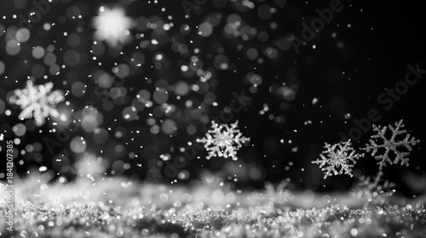 Obraz Silver hanging snowflakes border on black background. Winter holiday decoration with copy space for text