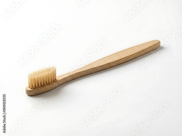 Fototapeta A single natural bamboo toothbrush, an essential eco-friendly tool for daily dental hygiene, symbolizing a commitment to sustainability and a healthy, conscious lifestyle