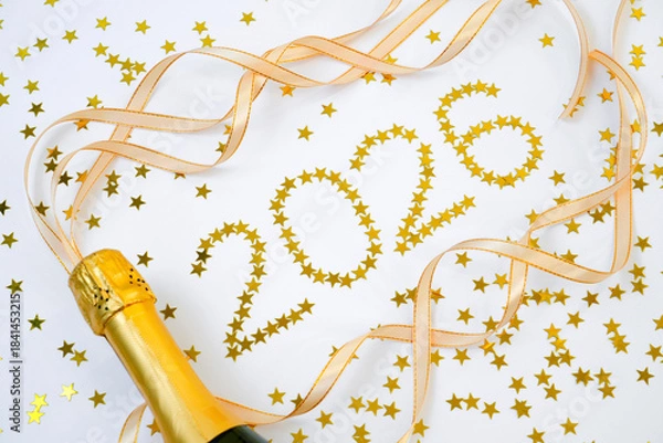 Obraz 2026 scene captures a moment of celebration and joy. Bottle of sparkling wine is poised to be opened, surrounded small golden stars that create a festive vibe.