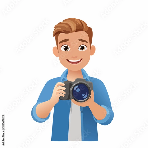 Fototapeta Young Man Smiling Happily While Holding a Digital Camera