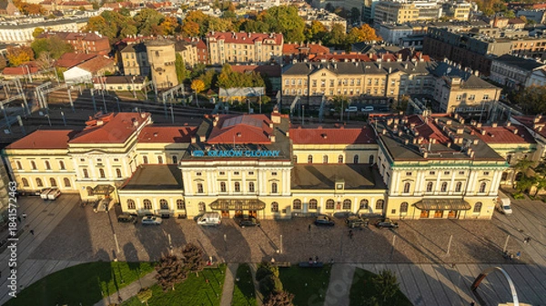 Fototapeta Dron morning view of Krakow Glowny railway station in Krakow, Poland, showing historic architecture.