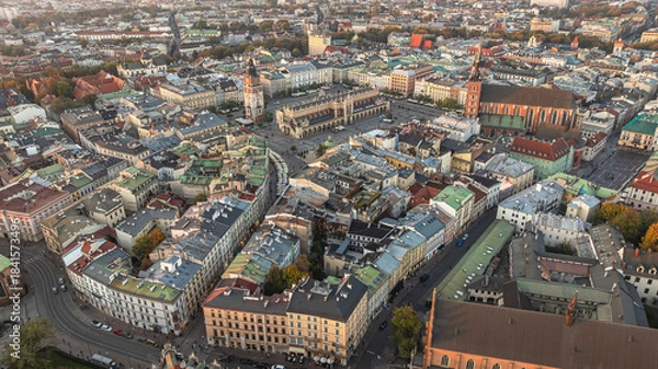 Fototapeta Aerial view of Krakow Old Town Square with St. Mary's Basilica and historic European architecture.