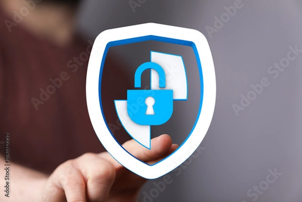 Obraz Secure digital data concept with person touching a shield with a lock, protecting private information and cybersecurity.