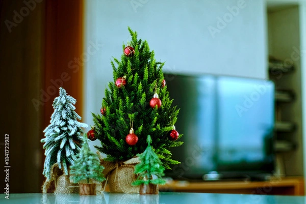 Obraz Modern appartment with 4 tiny christmas trees.