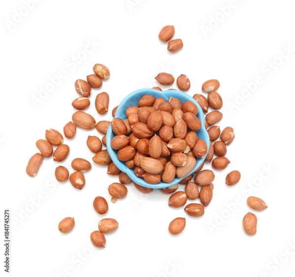 Obraz Dried peanuts in closeup on white