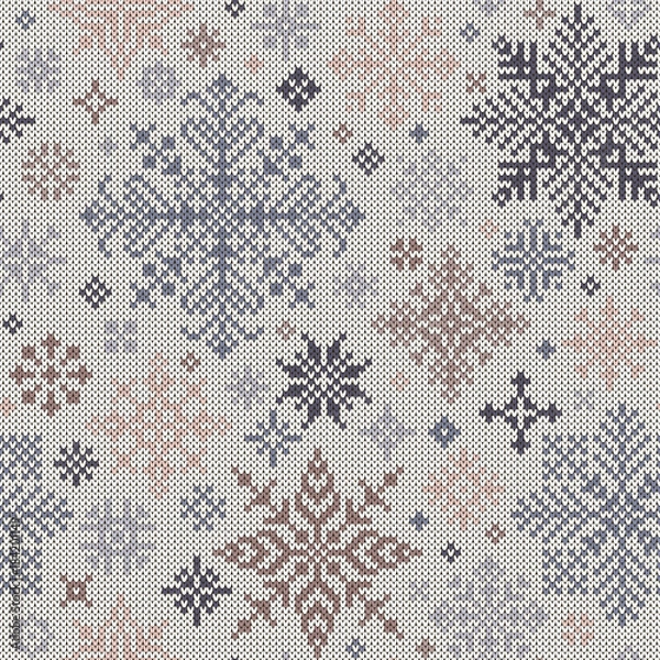 Fototapeta Seamless knitted pattern from gray and beige snowflakes