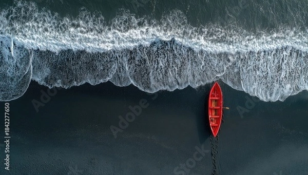 Obraz Red boat on dark beach with waves