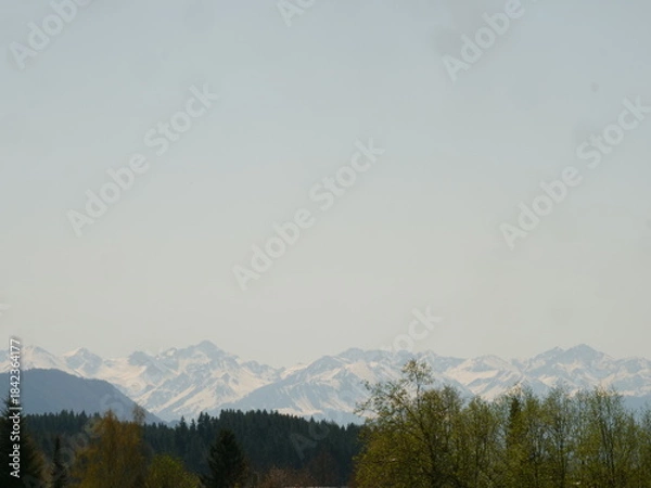 Obraz Mountain range is visible in the distance with a clear blue sky